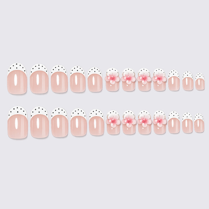 Artificial nail set with delicate floral designs and elegant accents Bowlift