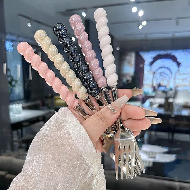 Stylish dessert forks Bowlift