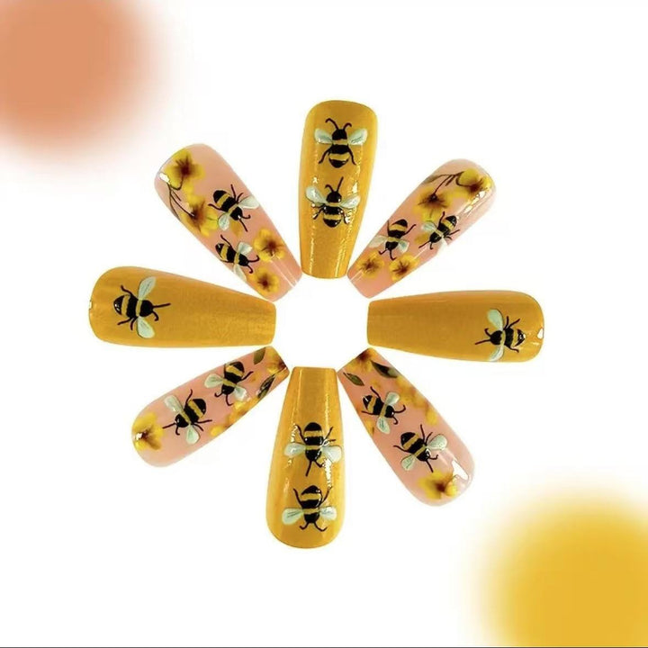 Nail art set with creative bee and flower designs Bowlift