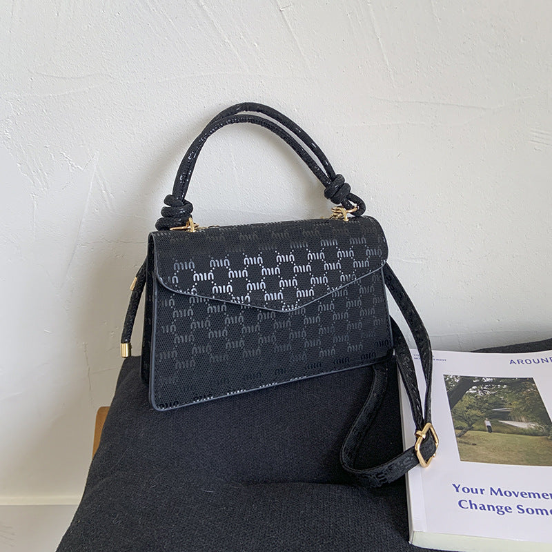 Elegant Monogrammed Handbag Bowlift