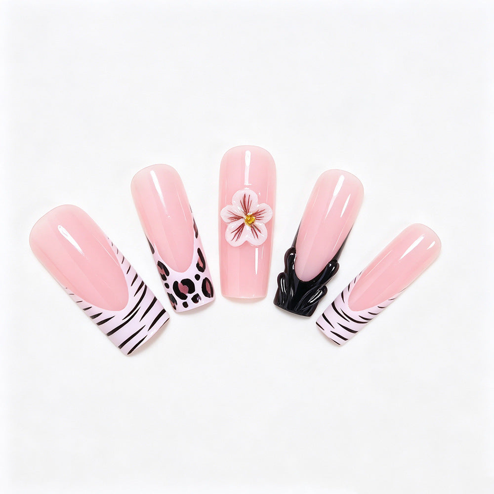 Artistic Press-On Nail Art Tips with Floral and Animal Print Designs Bowlift