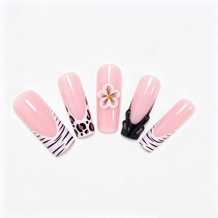 Artistic Press-On Nail Art Tips with Floral and Animal Print Designs Bowlift