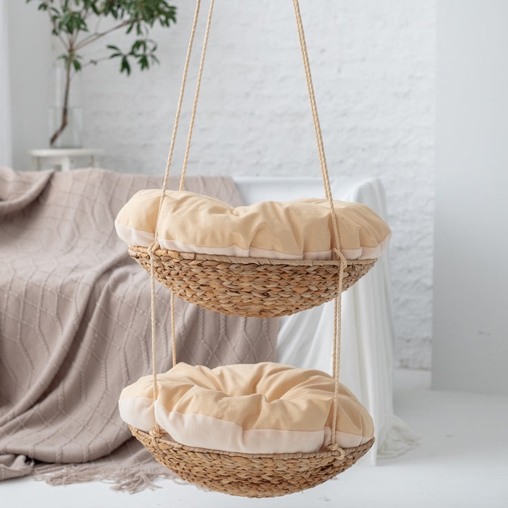 Hanging chair made of braided natural material with comfortable cushions Bowlift