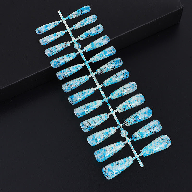 Creative nail art with blood splatter design Bowlift