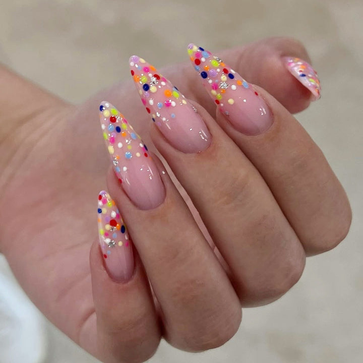 Acrylic nail set with colorful glitter dots and elegant tips Bowlift