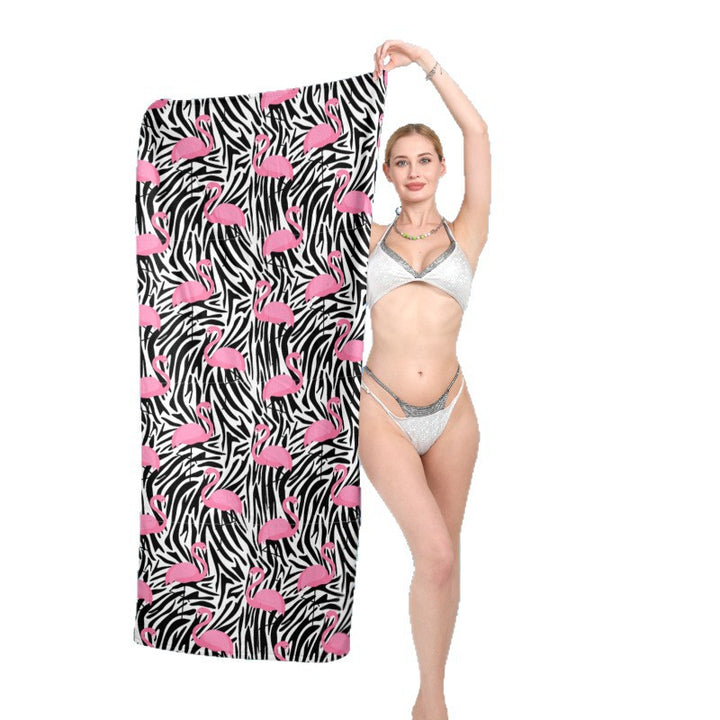 Beach towel with vibrant flamingo pattern and geometric design Bowlift