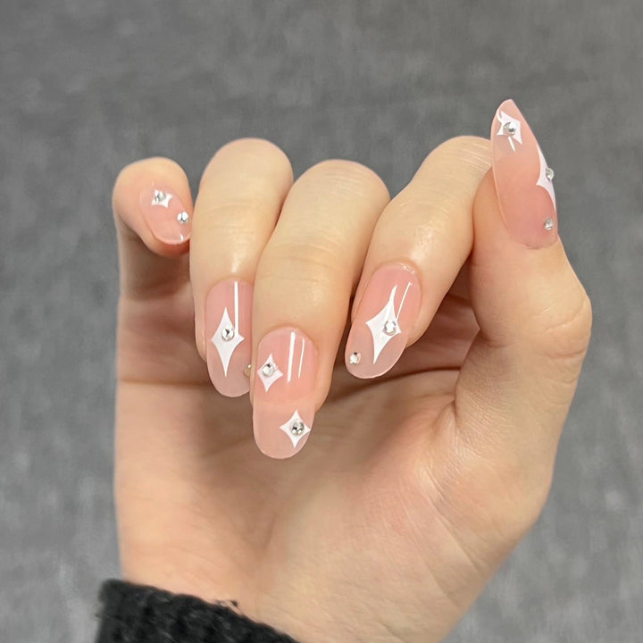 Artistic acrylic nails with glamorous glitter design Bowlift
