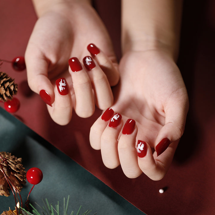 Elegant artificial nails with golden accents and floral design Bowlift