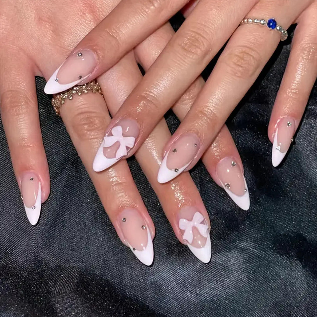 Elegant Stiletto Nail Art with Floral Designs Bowlift