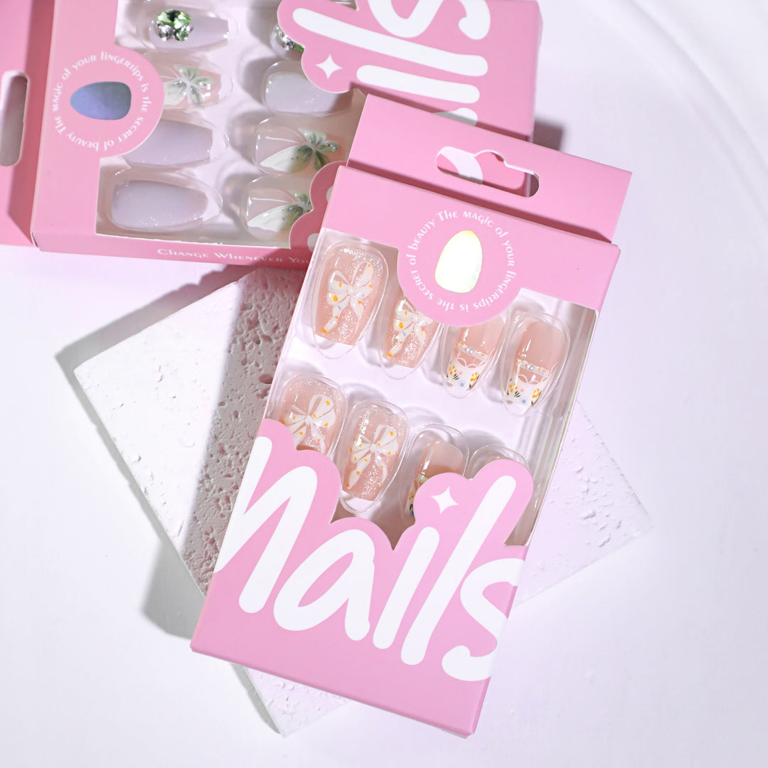 Artful Nail Extensions with Floral Design and Bow Accents Bowlift
