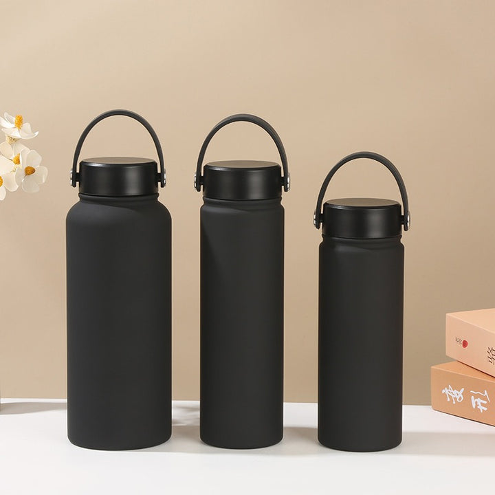 Women's insulated water bottle with ergonomic carrying handle Bowlift