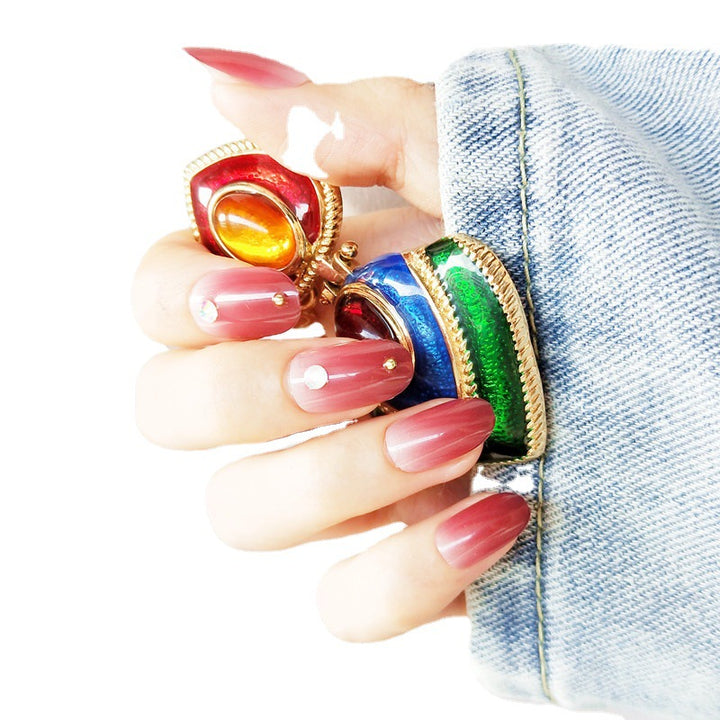 Artificial nails with elegant ombre effect and rhinestone decorations Bowlift