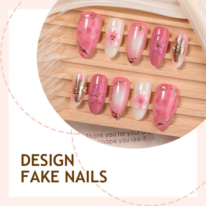 Artificial nail set with elegant flower and glitter details Bowlift