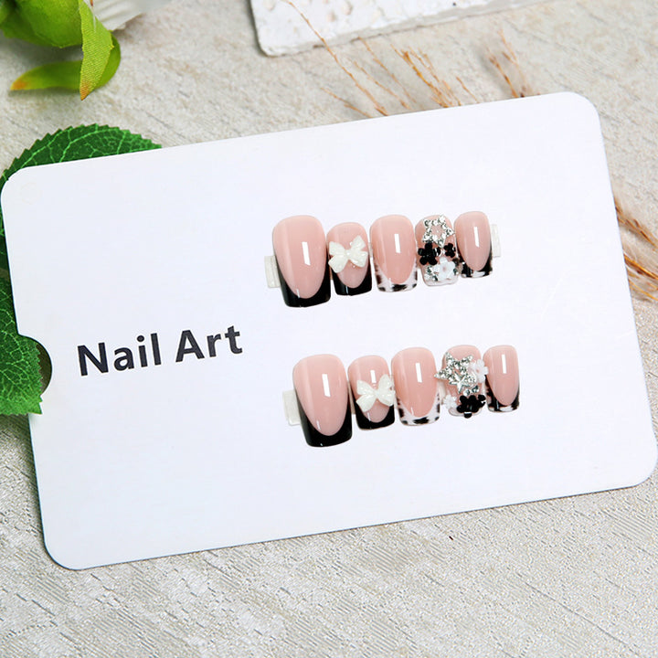 Elegant artificial nails with detailed embellishments Bowlift