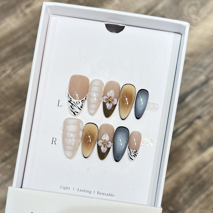 Artistic Stiletto Press-On Nail Set with Floral Accent Bowlift