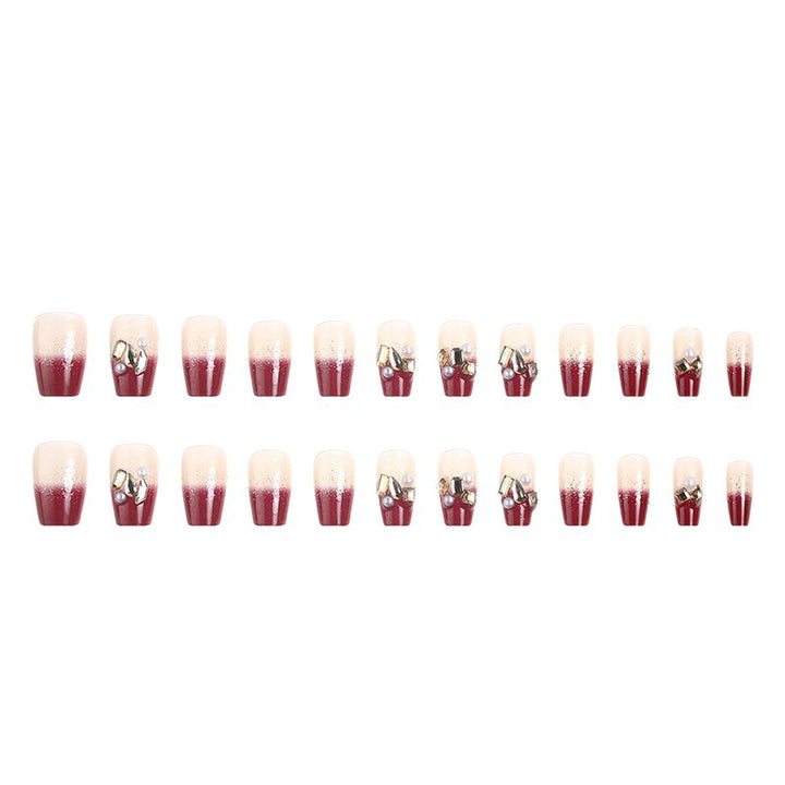 Acrylic nail set with elegant glitter and flower accents Bowlift