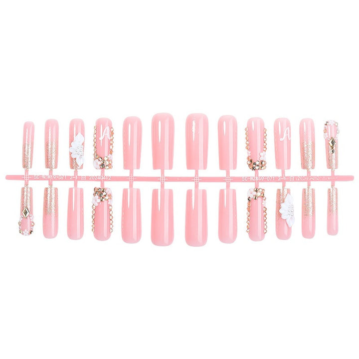 Creative acrylic nail set with delicate flower and gloss embellishments Bowlift