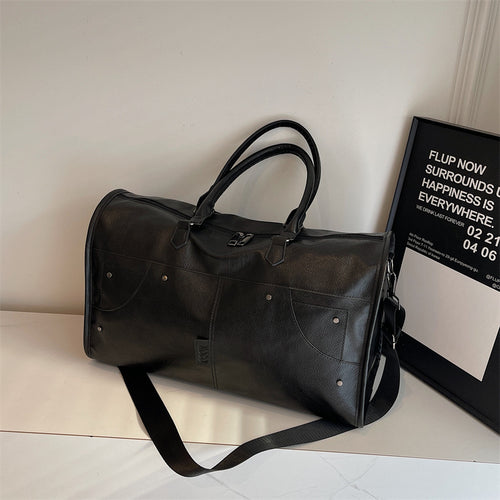 Elegant leather bag with stylish design and versatile carrying options Bowlift