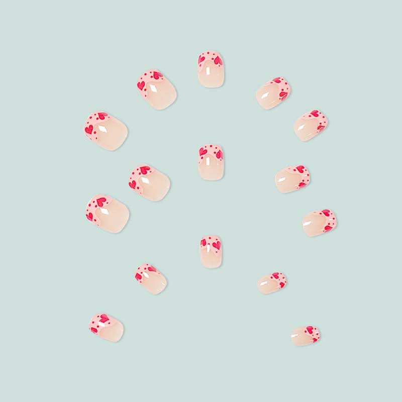 Artfully designed nail tips with heart motifs Bowlift