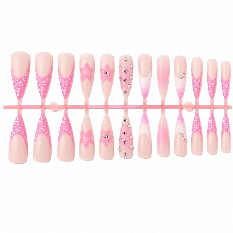 Nail art set with elegant floral embellishments and glamorous accents Bowlift