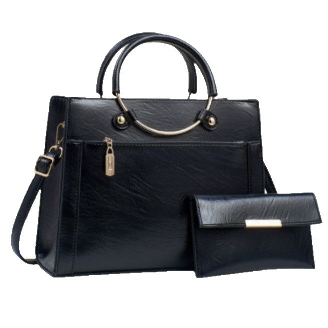 Elegant handbag with detachable shoulder strap and matching wallet Bowlift