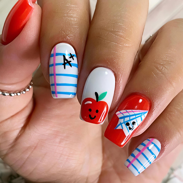 Creative art nails with cheerful school motif Bowlift