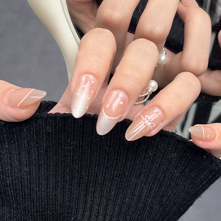 Glamorous Press-On Nail Set with Decorative Gemstone Accents Bowlift