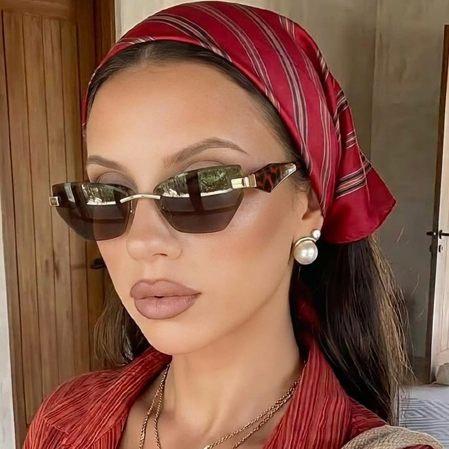 Rimless Geometric Cat-Eye Sunglasses with Sculpted Temples Bowlift