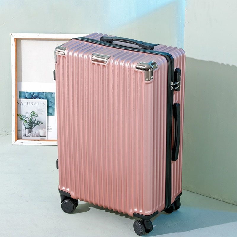 Hard shell suitcase with 360-degree wheel system and integrated safety feature Bowlift