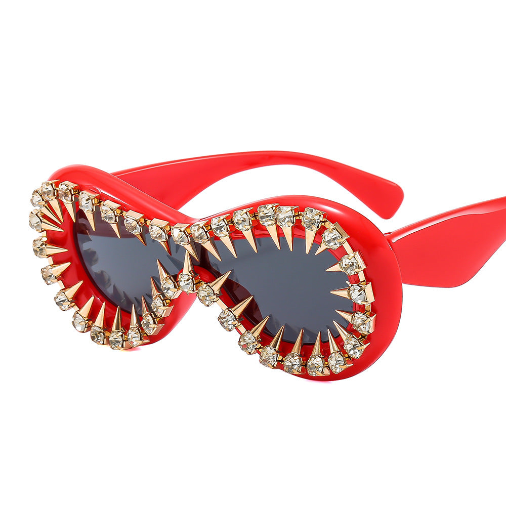 Women's fashionable sunglasses with extravagant spikes and crystal embellishments Bowlift