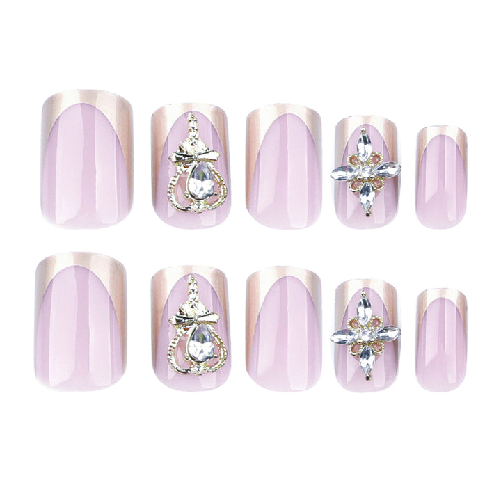 Artful Nail Extensions with Gold Accents Bowlift