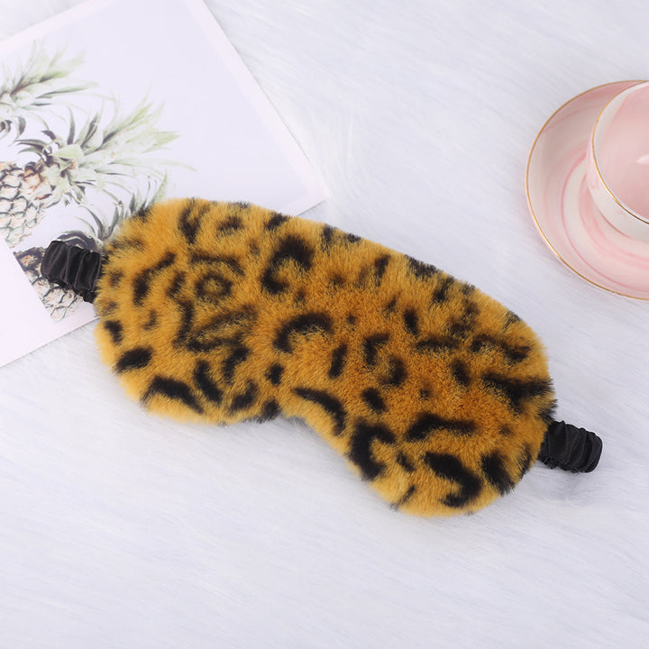 Women's cuddly faux fur sleep mask with heart-embossed surface and gathered comfort band Bowlift