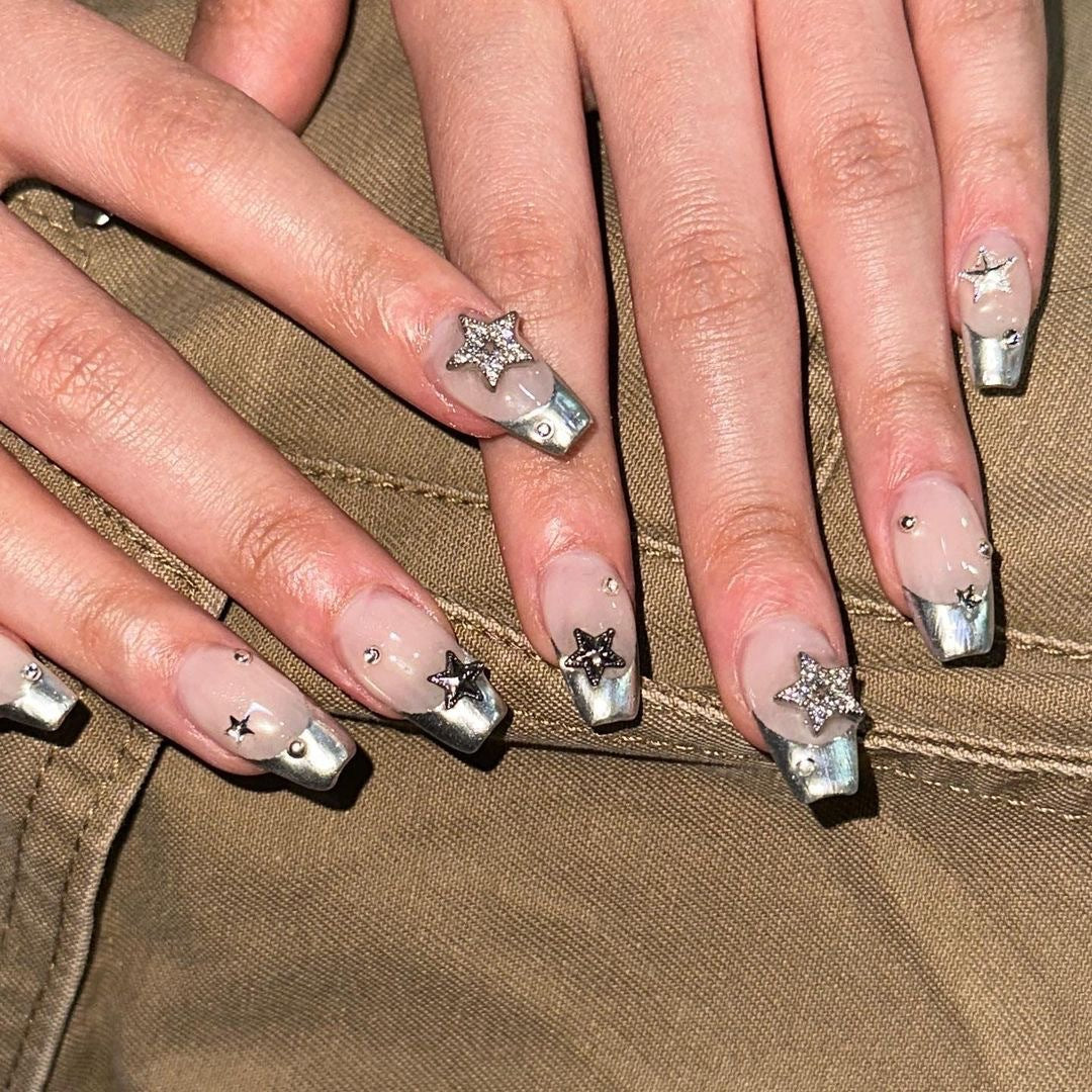 Glamorous acrylic nails with sparkling star design Bowlift