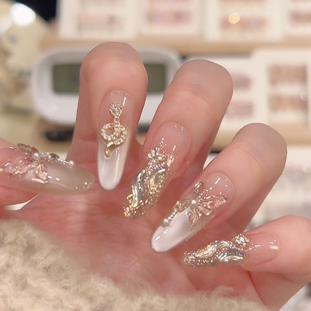 Artistic Gem-Accented Press-On Nail Extensions Bowlift