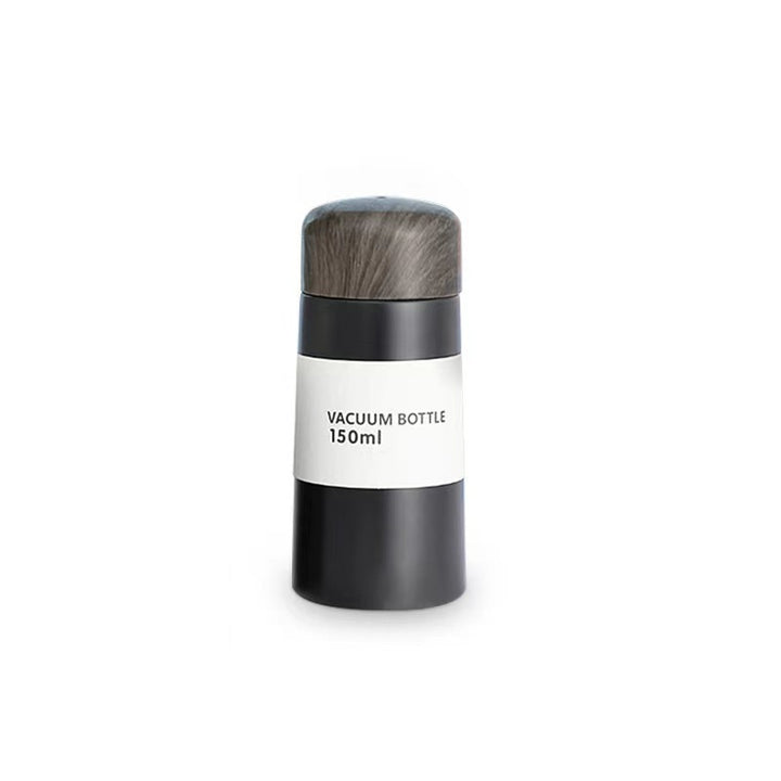 Women vacuum-insulated water bottle with innovative wooden lid Bowlift