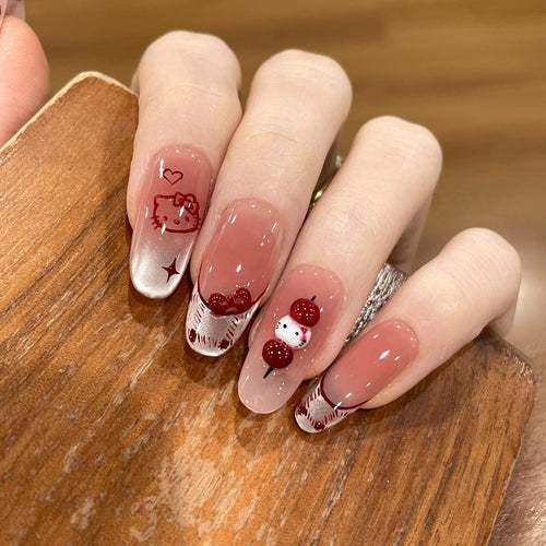 Artificial nails with playful Hello Kitty design Bowlift