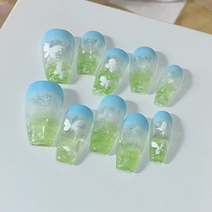 Artificial nails in summer style with butterfly design Bowlift