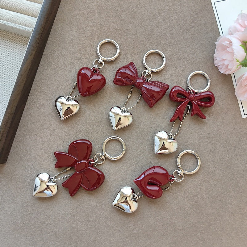 Keychain with bow and heart motif Bowlift