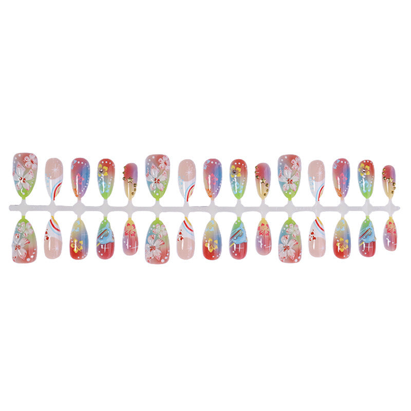 Artificial nail set with various designs and shiny embellishments Bowlift