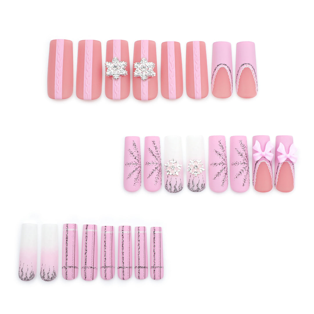 Artful nail extensions with festive decorations Bowlift