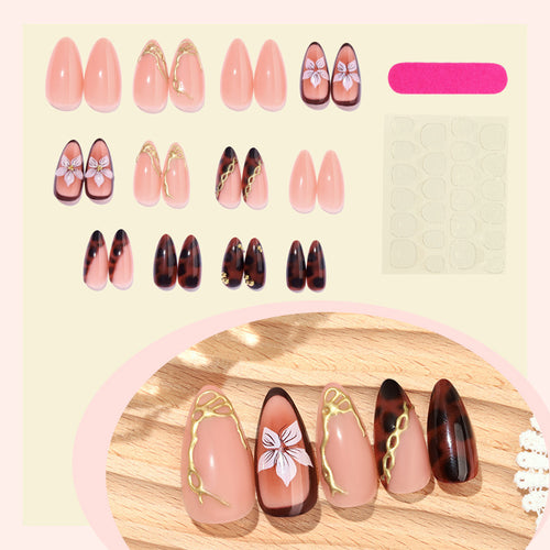 Artificial nail set with elegant floral decor and glitter elements Bowlift