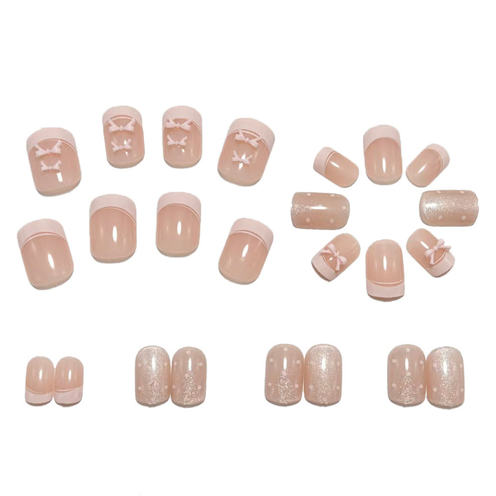 Artificial nails with delicate bows and glitter accents Bowlift