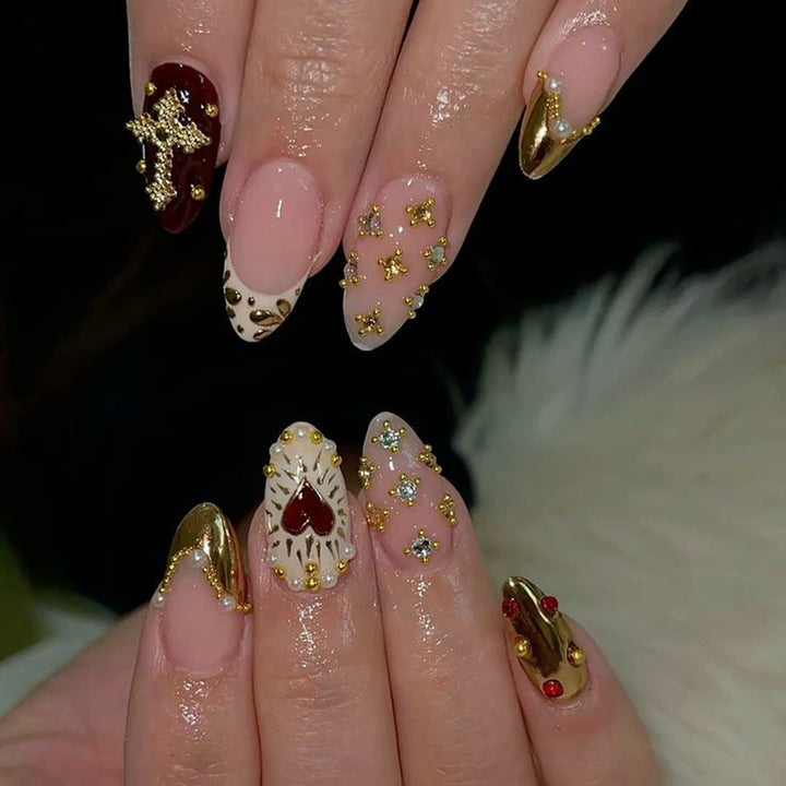 Artful nail art with rhinestone and gold accents Bowlift