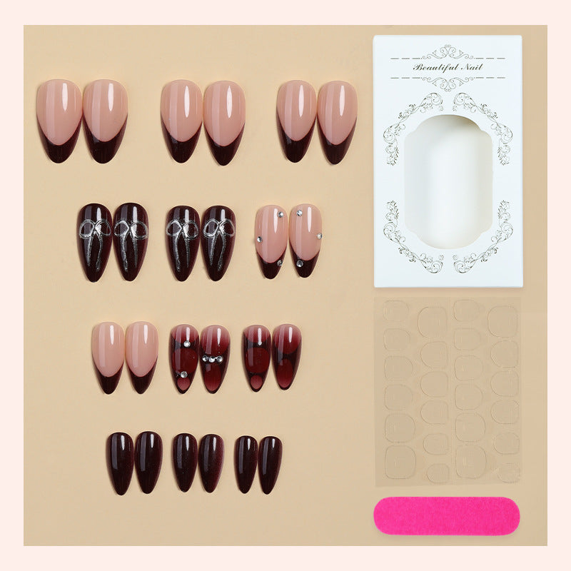 Creative nail art set with elaborate two-tone effect and elegant embellishments Bowlift