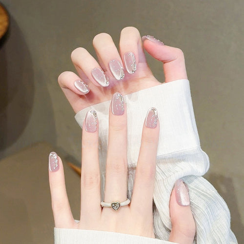Elegant artificial nail tips with glitter effects Bowlift