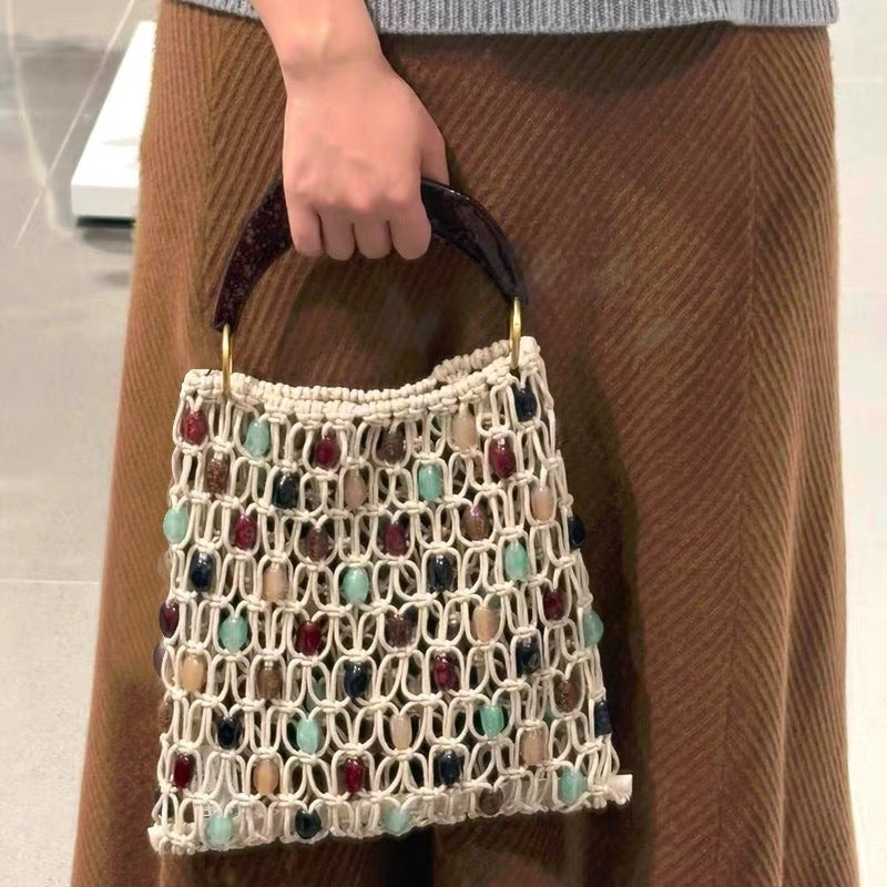 Handcrafted designer shoulder bag with unique stone accents Bowlift
