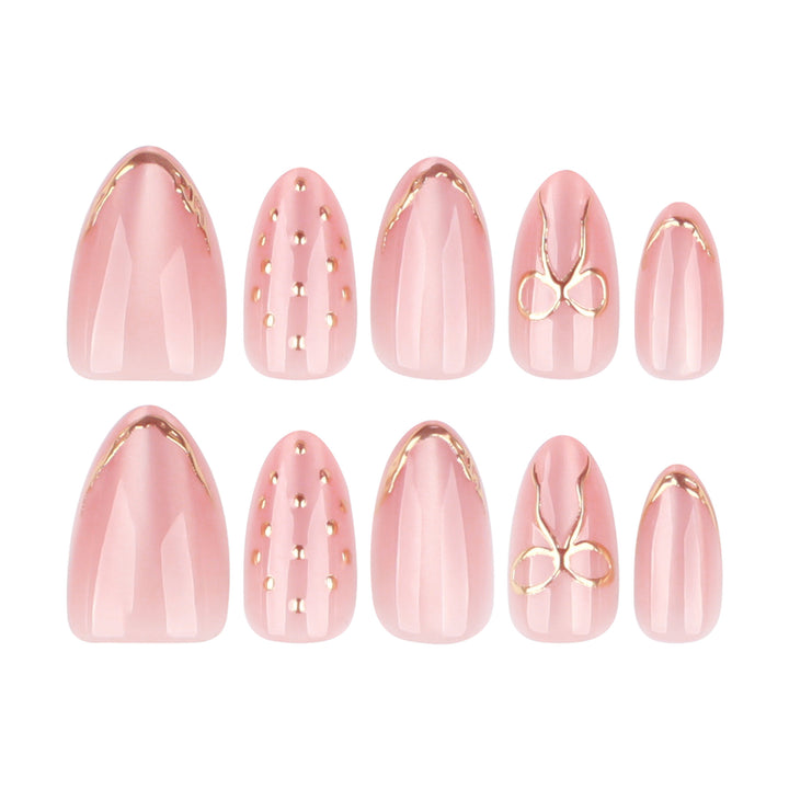 Artful nail extensions with elegant golden accents Bowlift