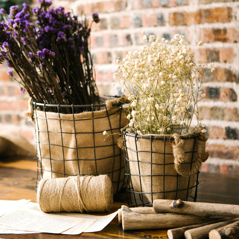 Decorative storage basket made of wire and linen Bowlift