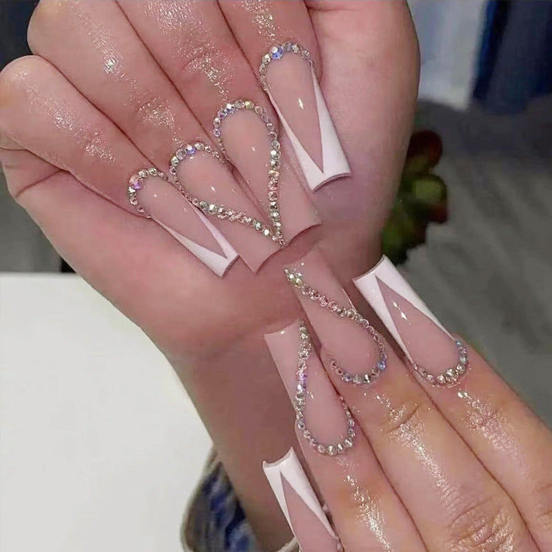 Stylish Press-On Nail Design with Elegant Rhinestone Accents Bowlift