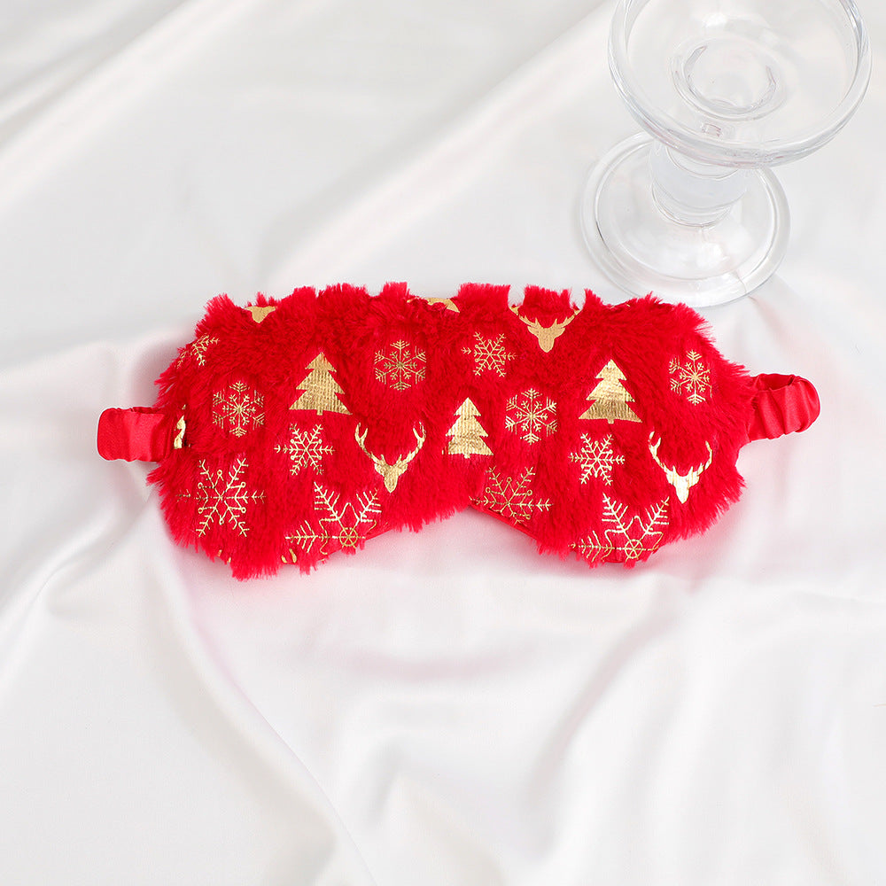 Unisex soft eye mask made of faux fur with festive motif embossing Bowlift